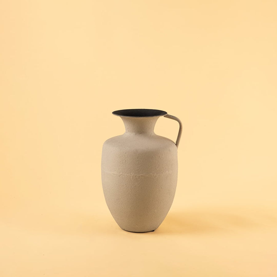 Cream metal jug vase decor on a clean white background highlighting its textured matte finish for versatile home styling.