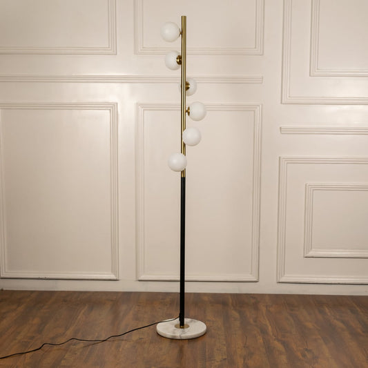 Globe floor lamp turned off against a white background showing product structure and design.