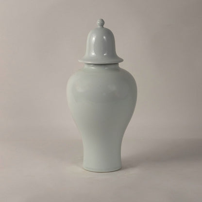 Elegant white ceramic ginger jar with lid in glossy finish perfect for modern home decor and table styling.