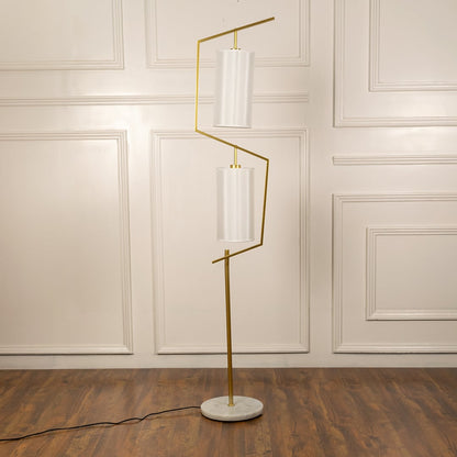Floor lamp with gold stand and white shades presented light off against a clean white background for catalog display.