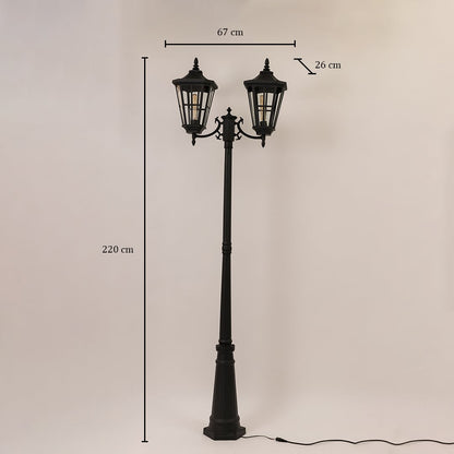 Black outdoor street lamp with dual heads shown with dimensions 220 cm height 67 cm width and 26 cm depth.