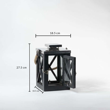 Dimensions of the Black Lantern are 27.5 cm in height and 18.5 cm in width ideal for tabletops patios and entryway décor.