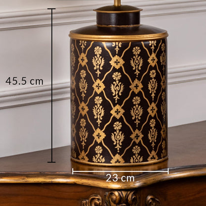 Table lamp featuring a black and gold patterned ceramic base shown with 45.5 cm height and 23 cm width details.