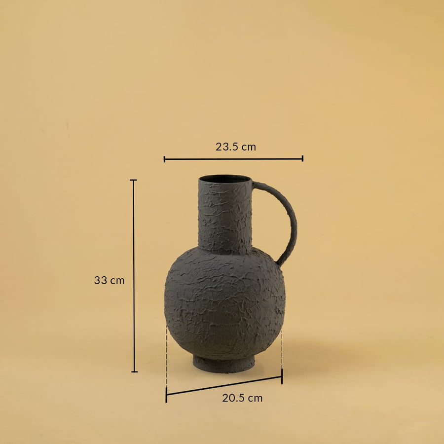 Grey textured jug vase shown with clear measurements featuring 33 cm height 23.5 cm width and 20.5 cm base width displayed against a plain background.