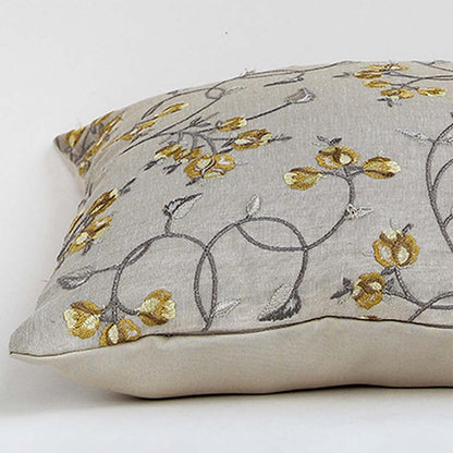 Light beige cotton cushion cover with grey and yellow floral embroidery ideal for modern home décor while providing a soft comfortable and skin friendly fabric experience.