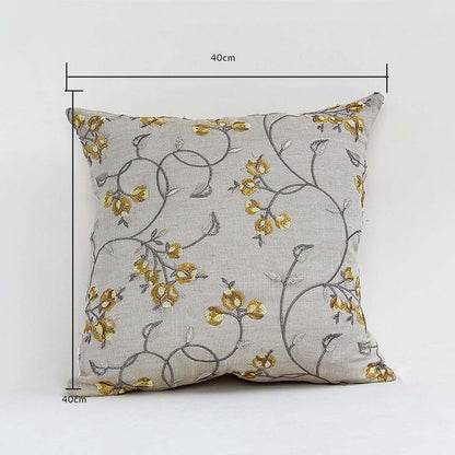 Cushion cover with yellow floral design shown with height and width guides marking its exact 40 cm x 40 cm size helping users choose the right option for home décor.