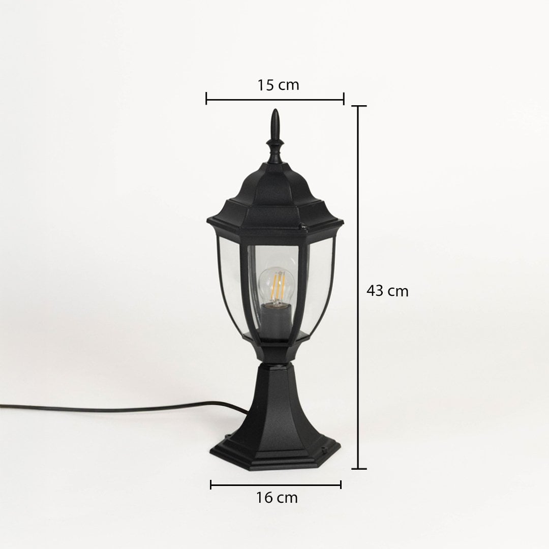 Outdoor black pillar lamp with hexagonal base clear glass and LED bulb showing 43 cm height and 16 cm width size.