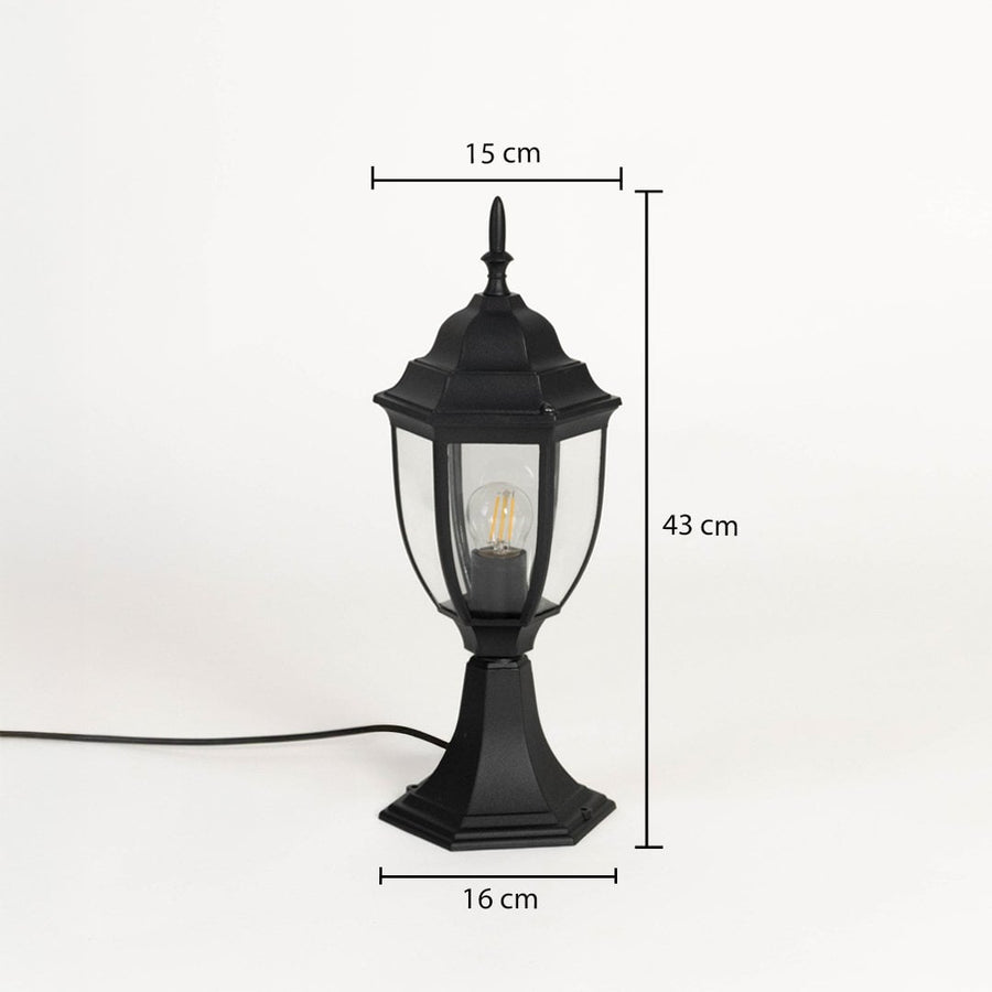 Outdoor black pillar lamp with hexagonal base clear glass and LED bulb showing 43 cm height and 16 cm width size.