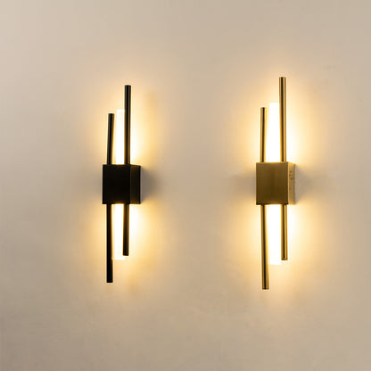 Modern gold metal wall lights glowing on white wall for luxury bedroom hallway and living room decor styling.
