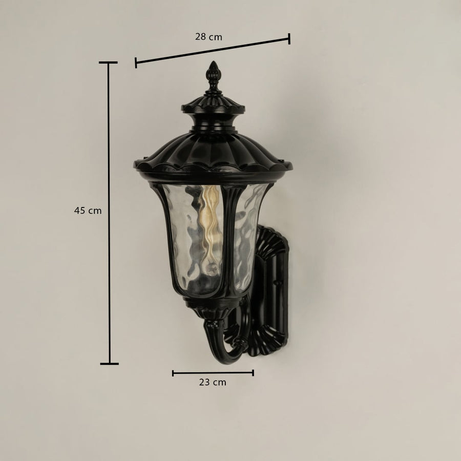A detailed dimensions view of the outdoor wall lantern showing height 45 cm width 23 cm and top extension 28 cm with ornate curves and textured glass structure.