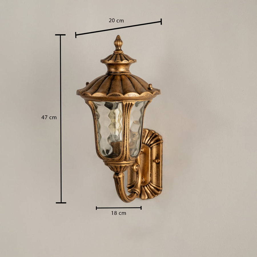 Gold metal outdoor wall lantern with textured glass shown with dimensions 47 cm height 20 cm width and 18 cm depth for accurate outdoor fitting.
