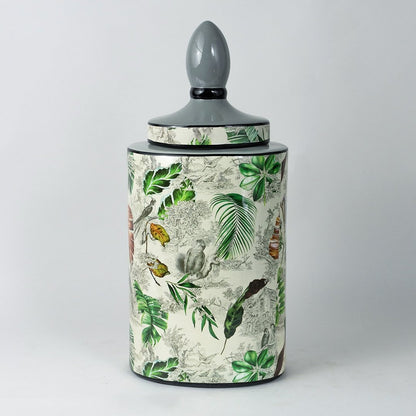 Tropical leaf jar with elegant botanical design shown clearly on a plain white background.