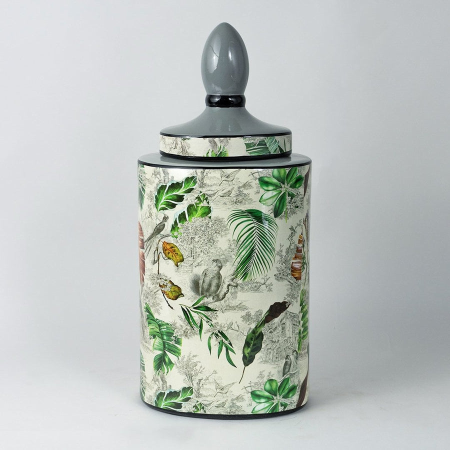 Tropical leaf jar with elegant botanical design shown clearly on a plain white background.