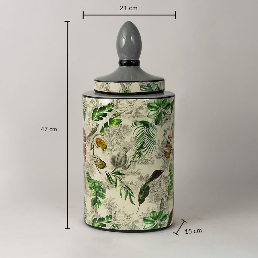 Tropical leaf jar measuring 47 cm in height and 21 cm in width with artistic botanical patterns.