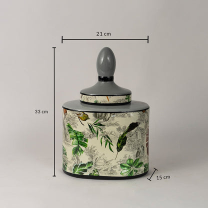 Tropical leaf jar measuring 33 cm tall and 21 cm wide with botanical detailing and grey lid design.