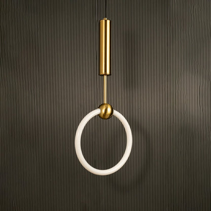 Ring pendant light with white circular shade and metal top shown switched off against a dark background presenting its refined contemporary interior decor silhouette.