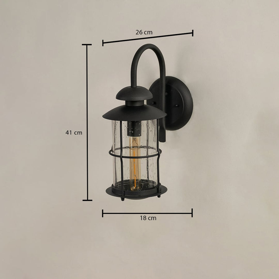 Black outdoor lantern showing 41 cm height 26 cm width and 18 cm depth with raindrop glass and curved arm design.