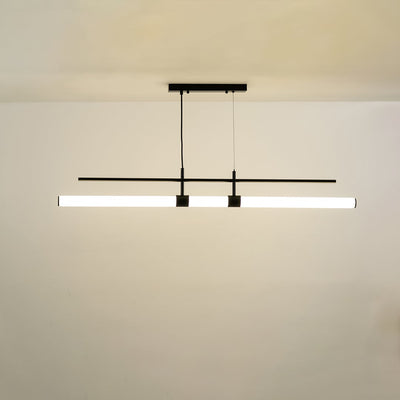 Long suspended linear light bar supported by two ceiling rods emitting a soft balanced glow that brings a refined contemporary touch to the surrounding room space.