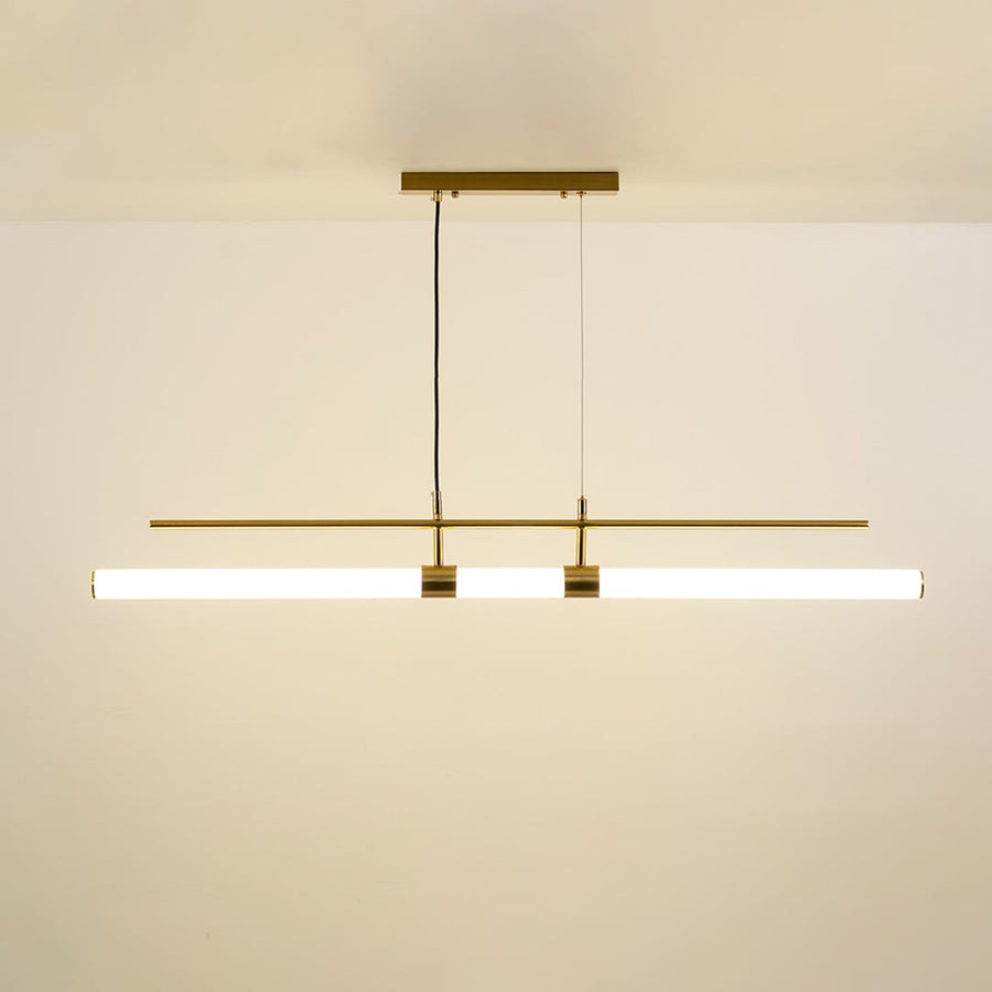 Gold metal linear pendant light with integrated LED bars creating sleek modern ambient lighting for dining spaces.