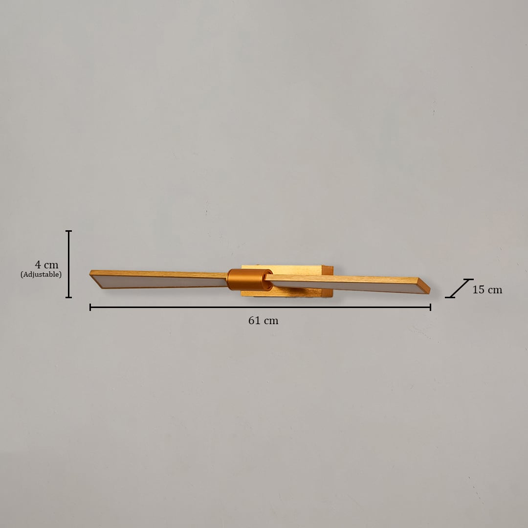 Gold metal picture light measuring 61 cm wide and 15 cm deep designed for illuminating paintings and framed artwork.