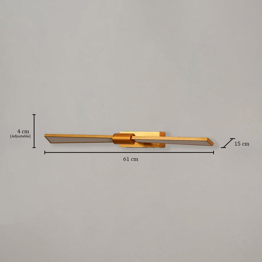 Gold metal picture light measuring 61 cm wide and 15 cm deep designed for illuminating paintings and framed artwork.