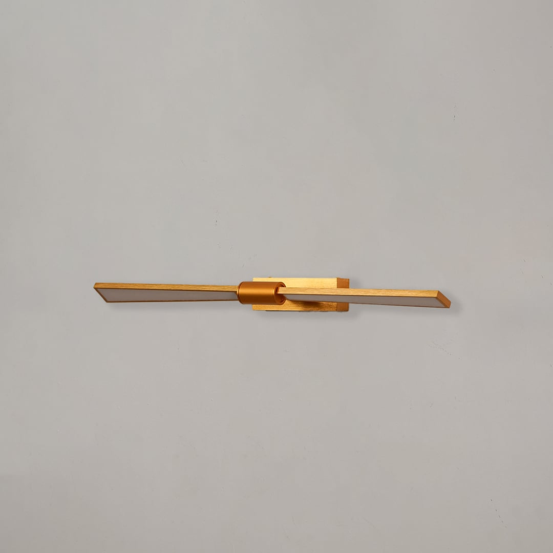 Gold metal picture light with sleek linear design for illuminating artwork mirrors and decorative wall displays.