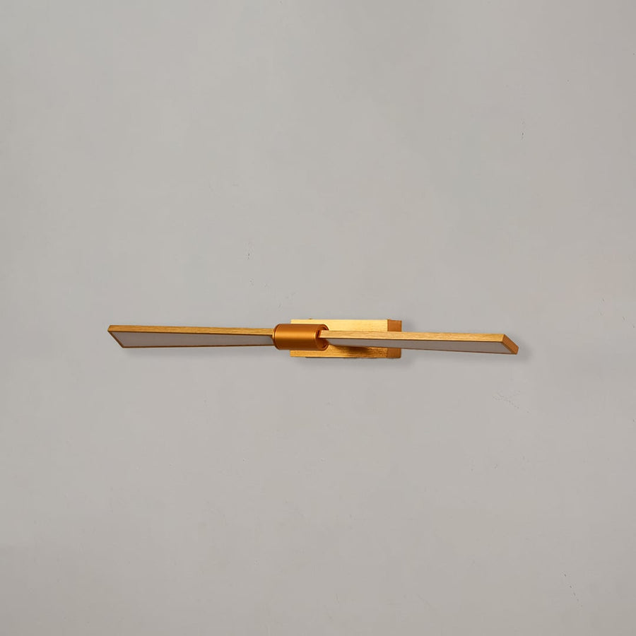 Gold metal picture light with sleek linear design for illuminating artwork mirrors and decorative wall displays.