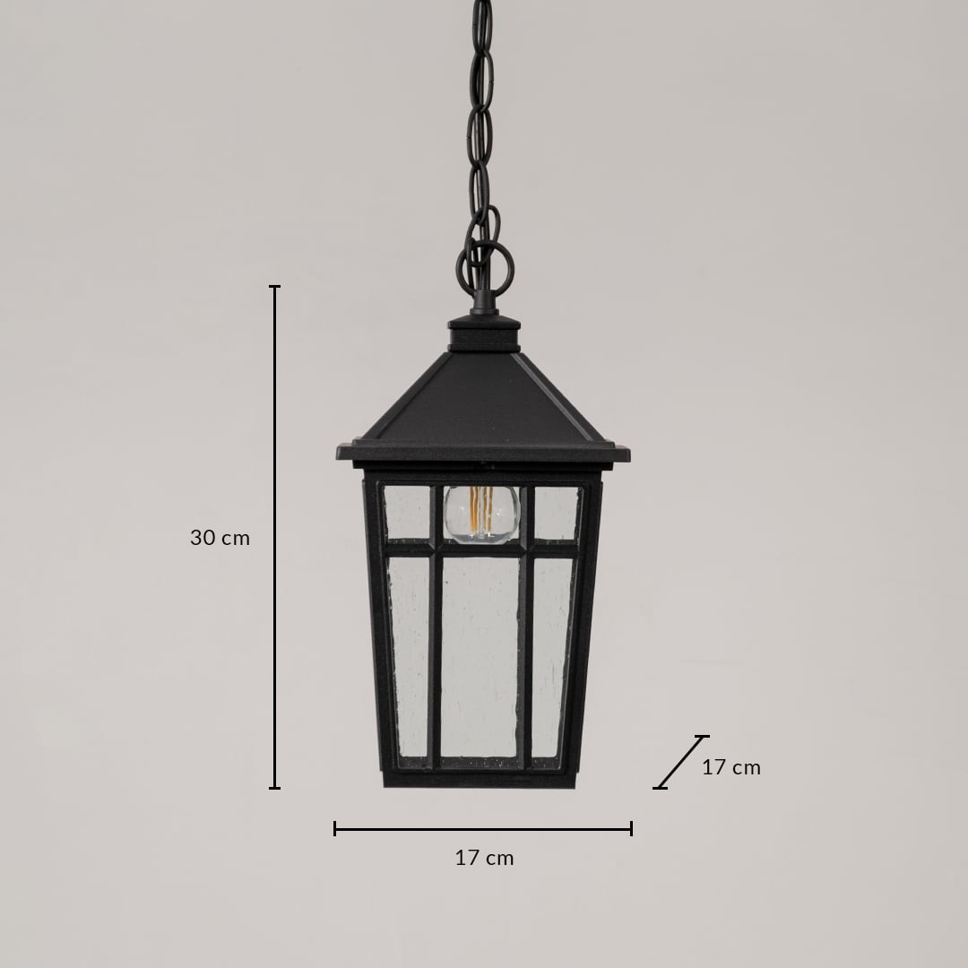 Classic black metal hanging lantern with clear glass measuring 30cm height 17cm width and 17cm depth specifications shown.Retry