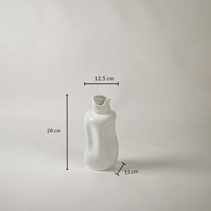 White ceramic sculptural vase shown with dimensions 28 cm height 12.5 cm width and 13 cm depth to display accurate sizing.