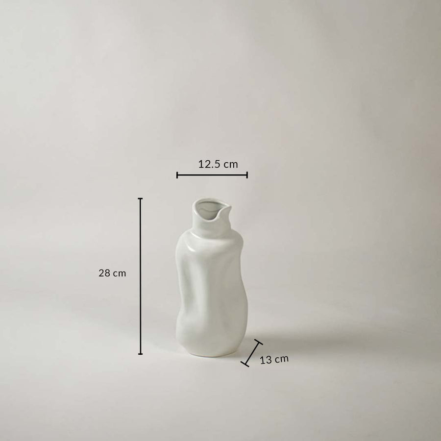 White ceramic sculptural vase shown with dimensions 28 cm height 12.5 cm width and 13 cm depth to display accurate sizing.