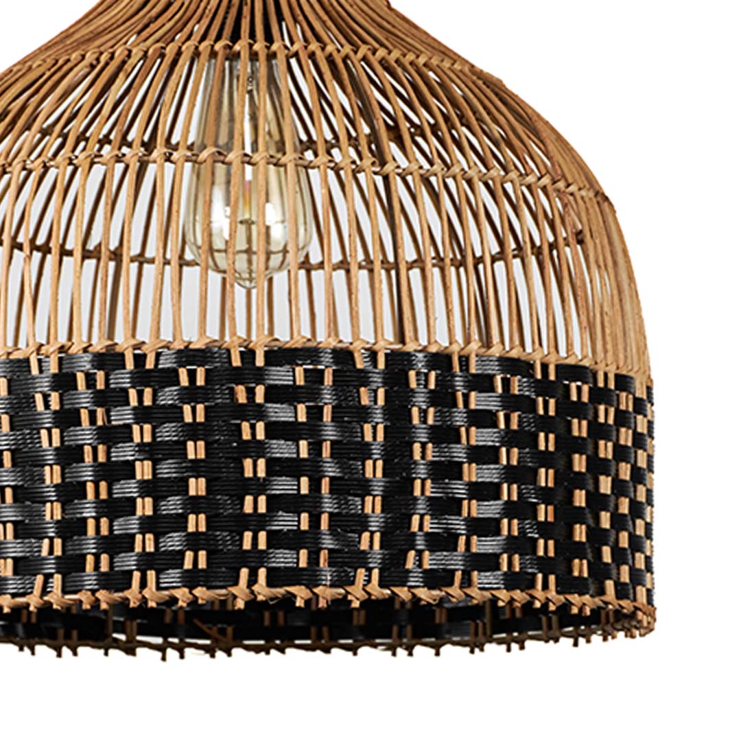 Closeup of rattan pendant light showing the fine bamboo weave and subtle black accent detailing on the shade.