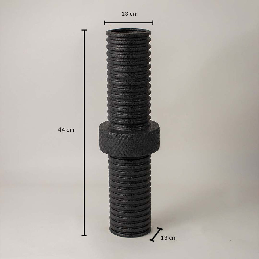 Black textured metal vase measuring 44 cm height and 13 cm diameter shown on neutral background for size reference.