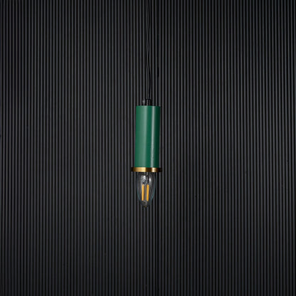 Green pendant light turned off with brass ring and clear bulb shown as elegant ceiling decor on black background.