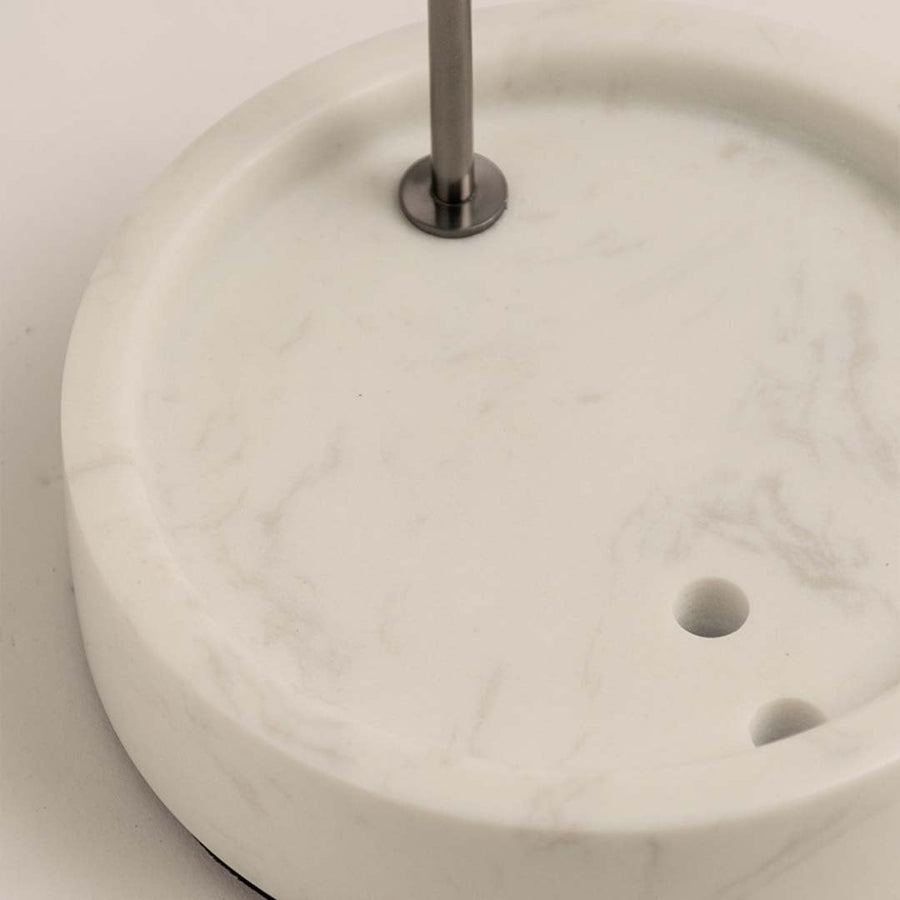 Detailed closeup of the upper metal ring of the vase displaying smooth finish and polished craftsmanship.