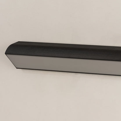 Closeup view of the matte black metal finish and white diffuser of the modern linear outdoor wall light fixture detail.