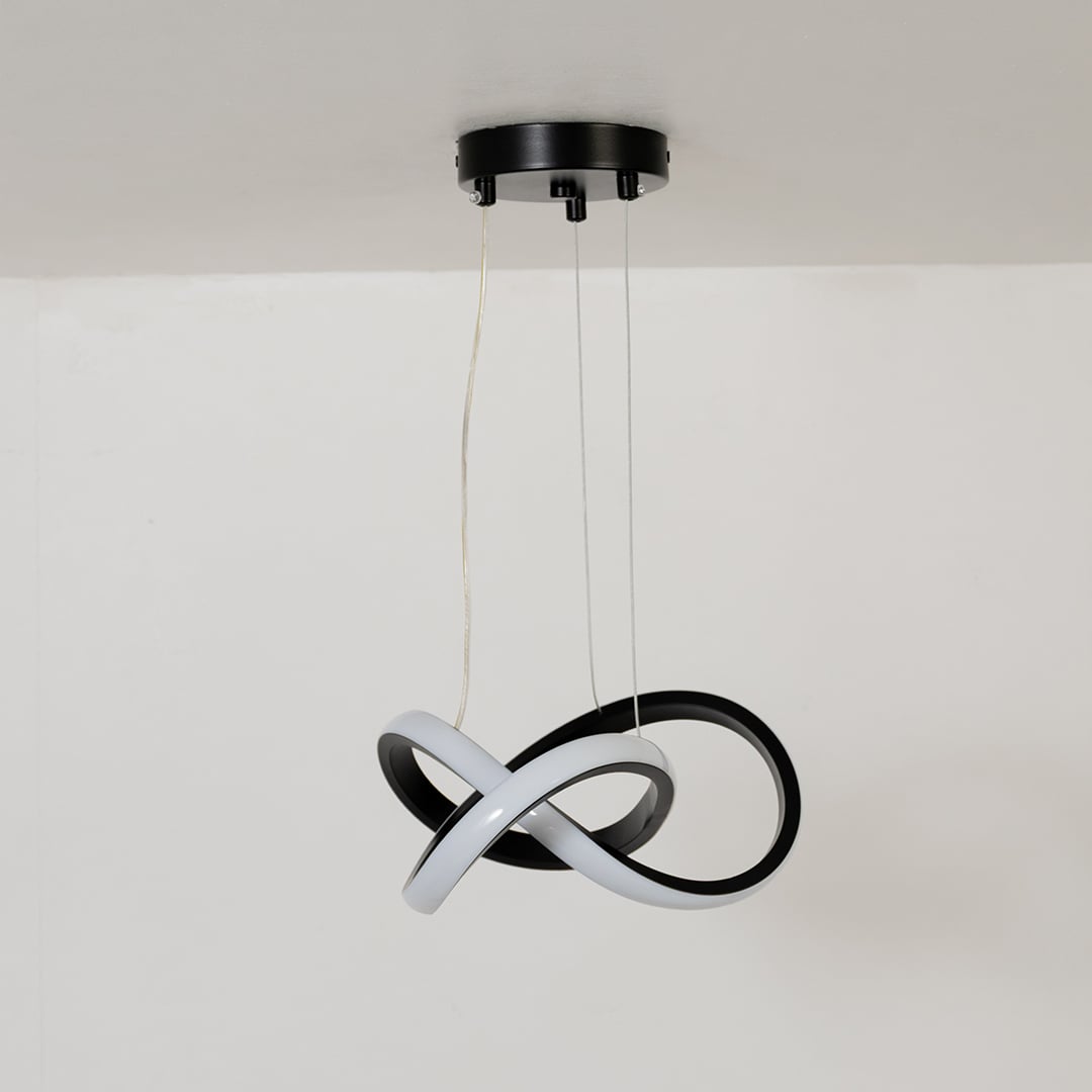 Minimalist LED chandelier with intertwined loop strips shown with light off on a white background.