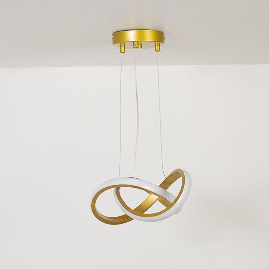 Minimalist loop LED chandelier in gold and white shown with the light off against a white backdrop.