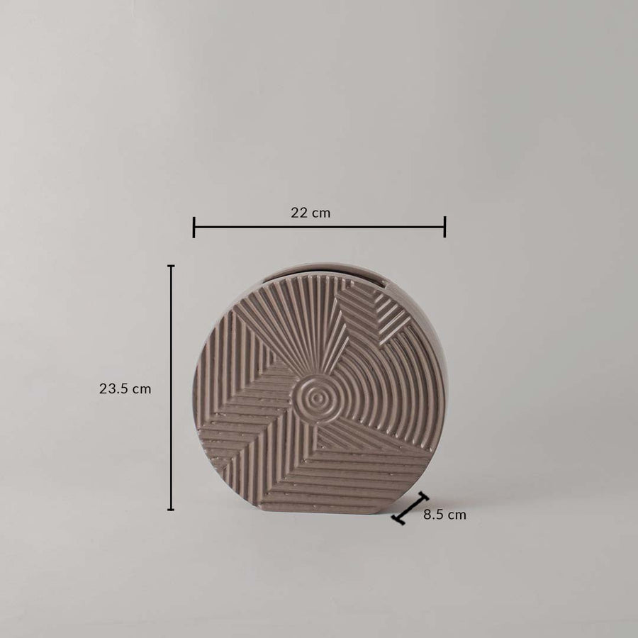 Round brown ceramic vase measuring approximately 8 inches in height and width perfect for fresh flowers or dried stems.