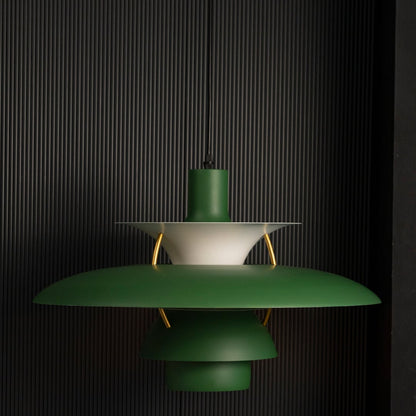 Green PH5 inspired metal pendant light displayed on black background showcasing smooth finish layered form and modern ceiling lighting appeal.