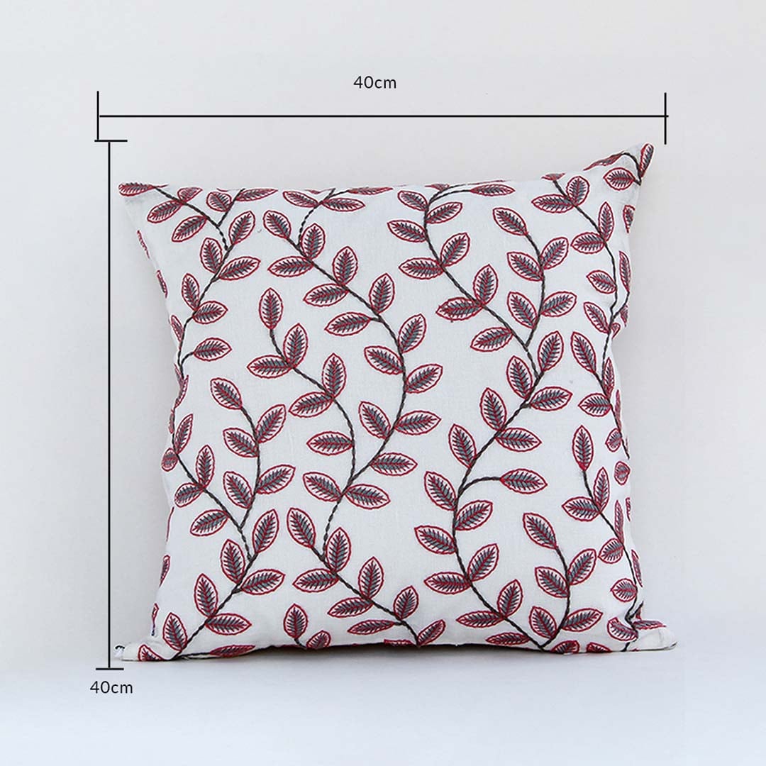 Floral cushion cover with red leaf pattern shown with measurement guides confirming its 40 cm x 40 cm size helping users pick premium home décor cushion options.