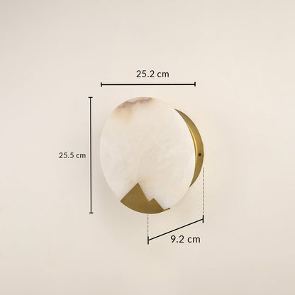Designer marble wall light measuring 25 cm with brass detailing ideal for modern interiors needing warm ambient wall illumination.