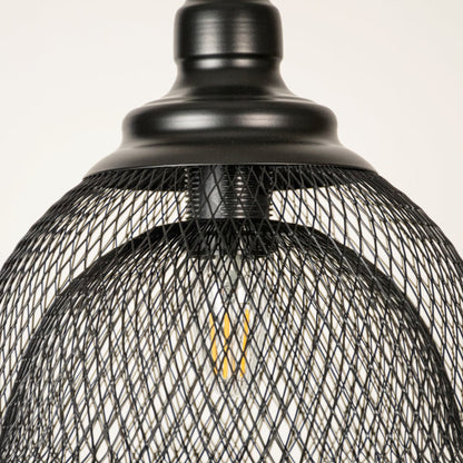 Black metal mesh pendant light closeup highlighting intricate wire detailing and premium industrial lighting craftsmanship.