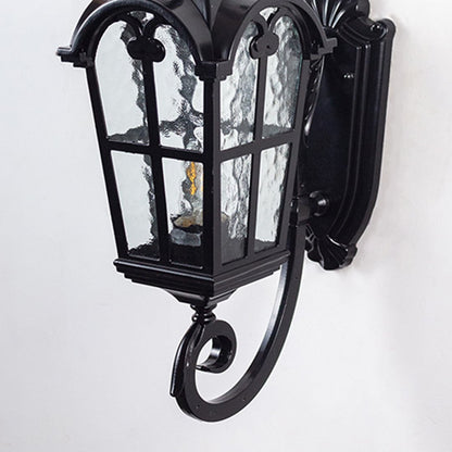 Closeup view of vintage lantern with intricate glass detailing and warm glow.
