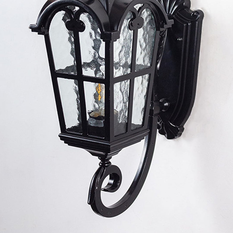 Closeup view of vintage lantern with intricate glass detailing and warm glow.