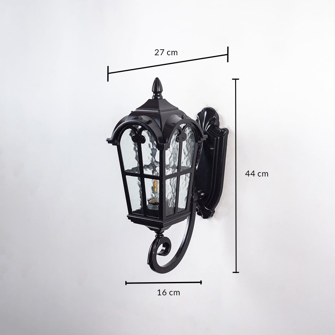 Lantern wall light dimensions 27 cm width 44 cm height and 16 cm depth are shown on white background.