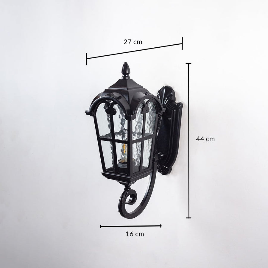 Lantern wall light dimensions 27 cm width 44 cm height and 16 cm depth are shown on white background.