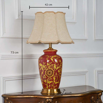 Red ceramic floral table lamp shown with 73 cm height 42 cm shade width and 42 cm base width on a wooden console for accurate size reference.