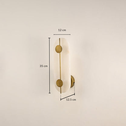Marble gold wall light with 20 cm height 12 cm width and 12.5 cm depth for modern decor spaces.

