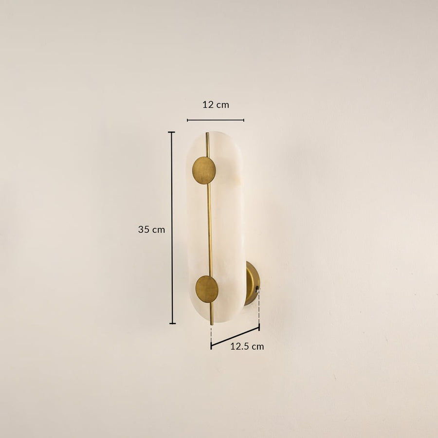 Marble gold wall light with 20 cm height 12 cm width and 12.5 cm depth for modern decor spaces.

