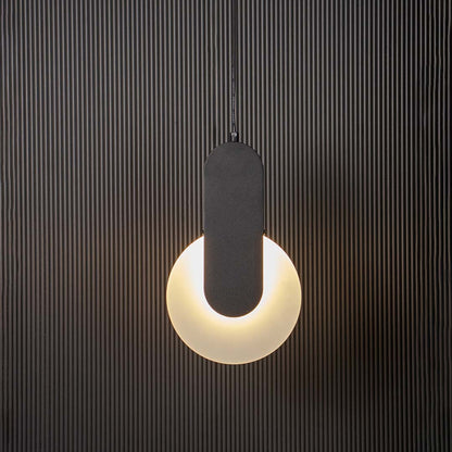 Geometric LED pendant light with black bar and white circular shade glowing on black background for home interiors/